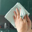 Special fish-scale cleaning cloth for glass cleaning does not leave traces. Household cleaning cloth removes oil from the kitchen without traces, absorbs water and does not shed hair